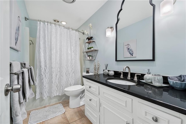 full bathroom with toilet, tile patterned flooring, vanity, and shower / bath combo