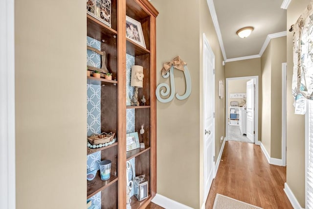 3125 Flatbottom Dr, Dacula, GA 30019 - corridor with baseboards, ornamental molding, and wood finished floors