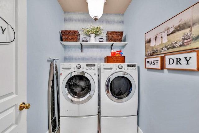 3125 Flatbottom Dr, Dacula, GA 30019 - clothes washing area with independent washer and dryer and laundry area