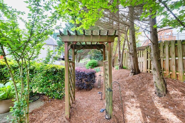 3125 Flatbottom Dr, Dacula, GA 30019 - view of yard with fence and a pergola