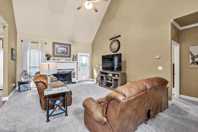 3125 Flatbottom Dr, Dacula, GA 30019 - carpeted living area with baseboards, ceiling fan, a wealth of natural light, and high vaulted ceiling