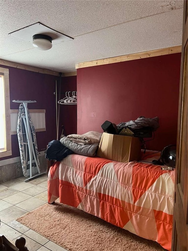 bedroom with tile patterned floors