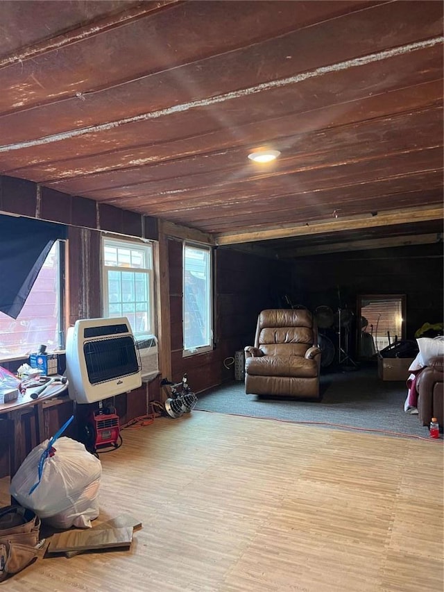 interior space featuring wood finished floors and wood ceiling