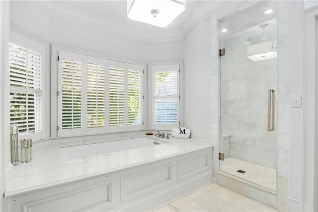 full bathroom with a shower stall, ornamental molding, and a bath