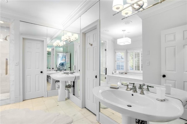 full bath featuring a sink, ornamental molding, a shower stall, and a garden tub