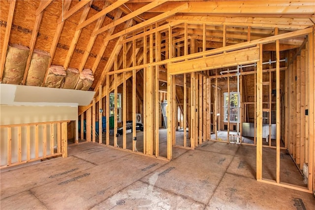 miscellaneous room featuring vaulted ceiling and visible vents