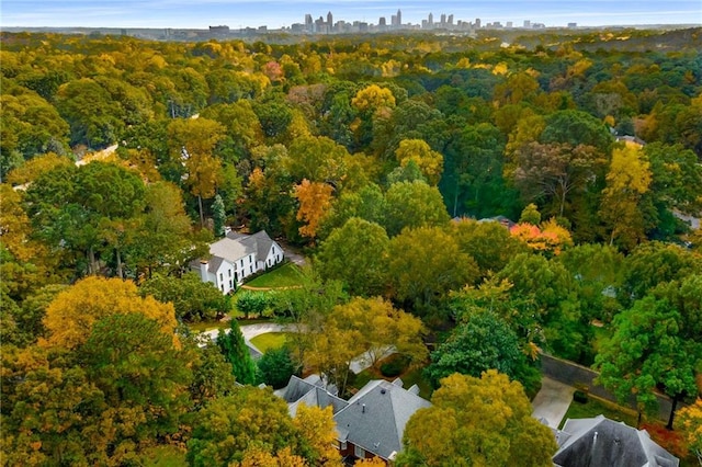 aerial view with a wooded view