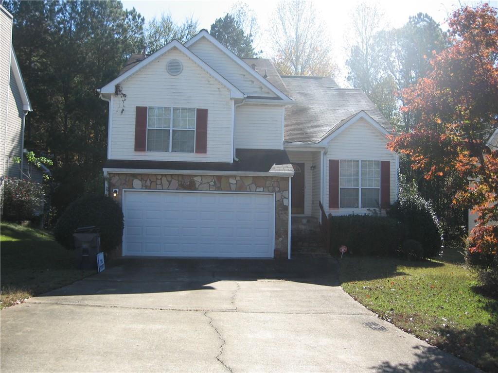 front of property featuring a garage