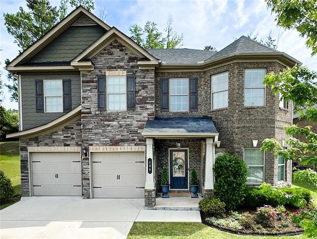 406 Dunaway Ct, Grayson, GA 30017 - craftsman house featuring a garage, driveway, and stone siding