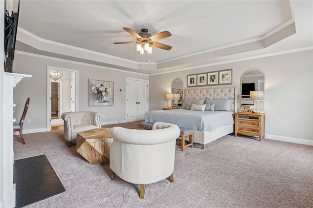 406 Dunaway Ct, Grayson, GA 30017 - carpeted bedroom with a raised ceiling, ornamental molding, and a ceiling fan