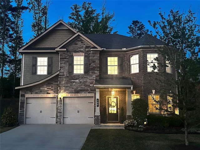 406 Dunaway Ct, Grayson, GA 30017 - view of front of property with an attached garage, driveway, and stone siding