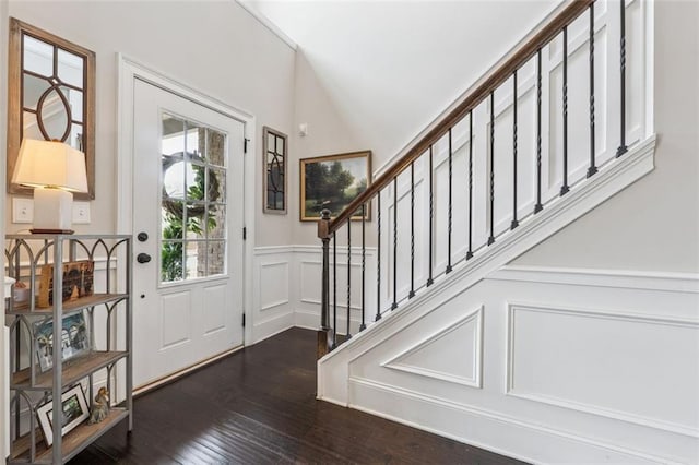 406 Dunaway Ct, Grayson, GA 30017 - entrance foyer with dark wood-style flooring, stairway, a wainscoted wall, and a decorative wall