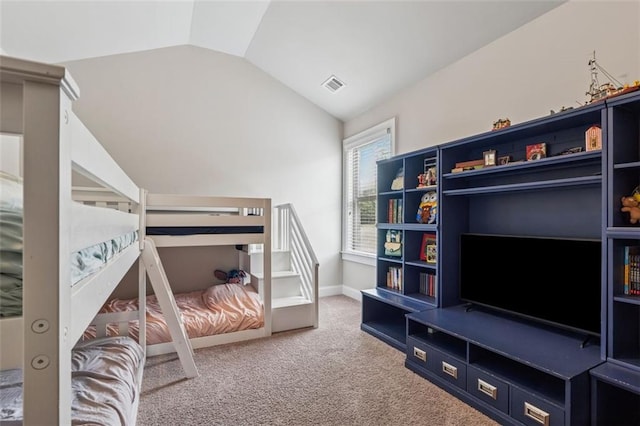 406 Dunaway Ct, Grayson, GA 30017 - carpeted bedroom featuring lofted ceiling and baseboards