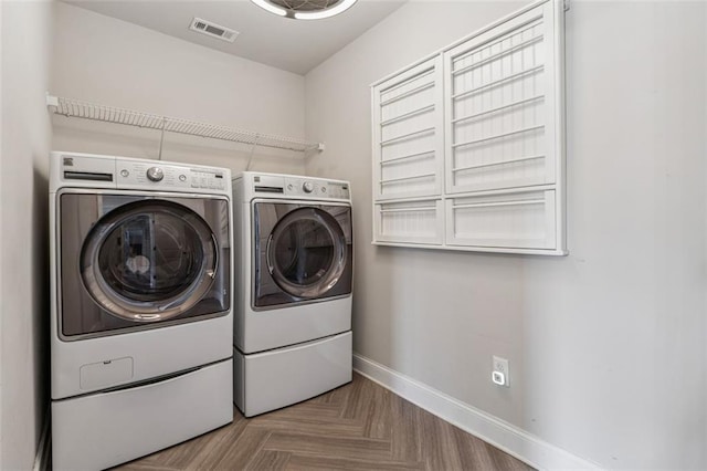 406 Dunaway Ct, Grayson, GA 30017 - laundry area featuring washer and dryer and baseboards