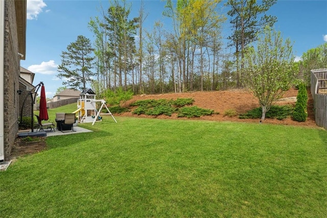 406 Dunaway Ct, Grayson, GA 30017 - view of yard with a playground and a patio