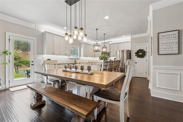 406 Dunaway Ct, Grayson, GA 30017 - dining area featuring crown molding, recessed lighting, plenty of natural light, a chandelier, and dark wood-type flooring
