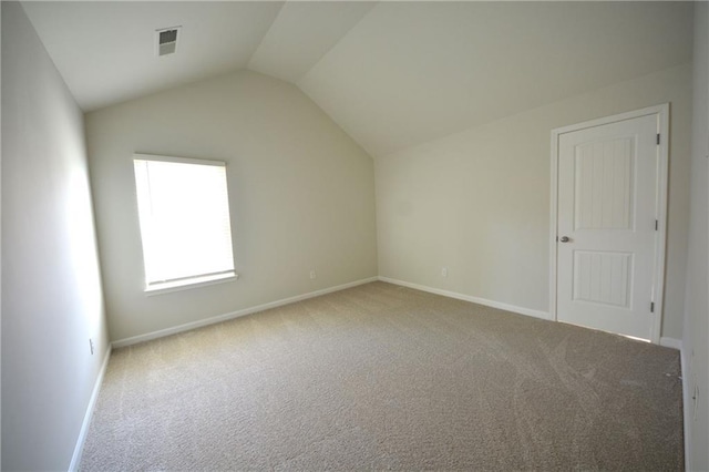 bonus room with carpet flooring, visible vents, baseboards, and vaulted ceiling