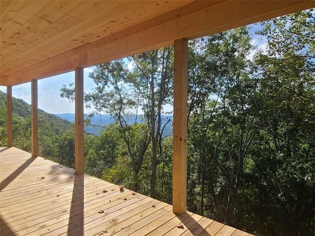 wooden terrace with a mountain view