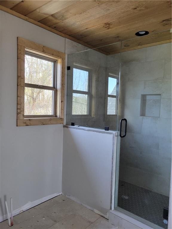 full bath featuring wood ceiling and a shower stall