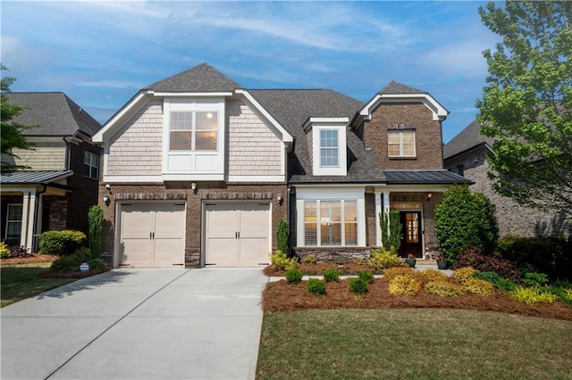 craftsman-style house with a front yard and a garage