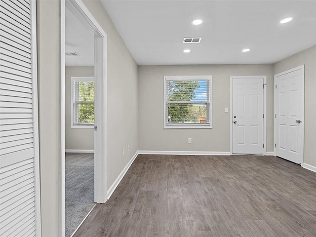 interior space with hardwood / wood-style floors