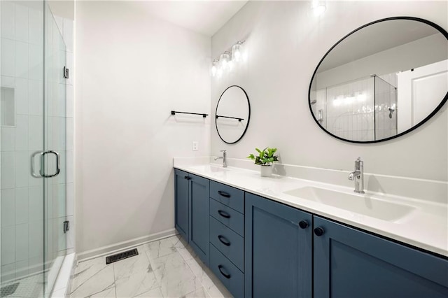 720 Perch Pl, Atlanta, GA 30312 - bathroom with marble finish flooring, double vanity, baseboards, and a shower stall
