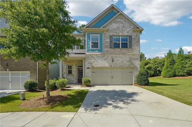 craftsman house with brick siding, an attached garage, concrete driveway, and a front lawn