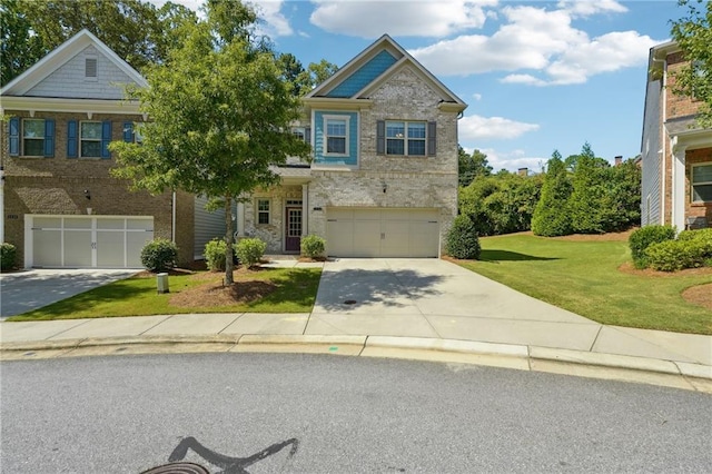 craftsman inspired home with a front lawn, an attached garage, brick siding, and driveway