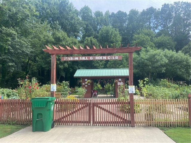 view of property's community with fence