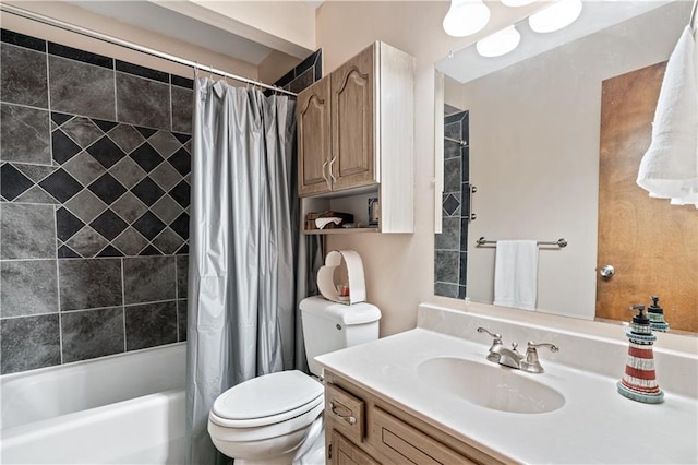 full bathroom featuring vanity, toilet, and shower / tub combo with curtain