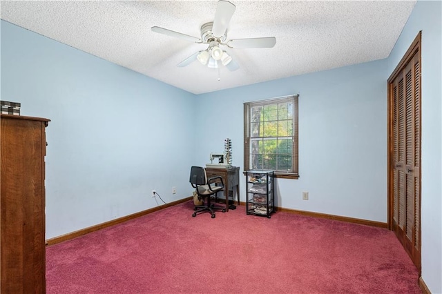 office space featuring ceiling fan, carpet floors, and a textured ceiling