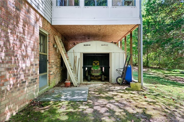 property entrance with a yard