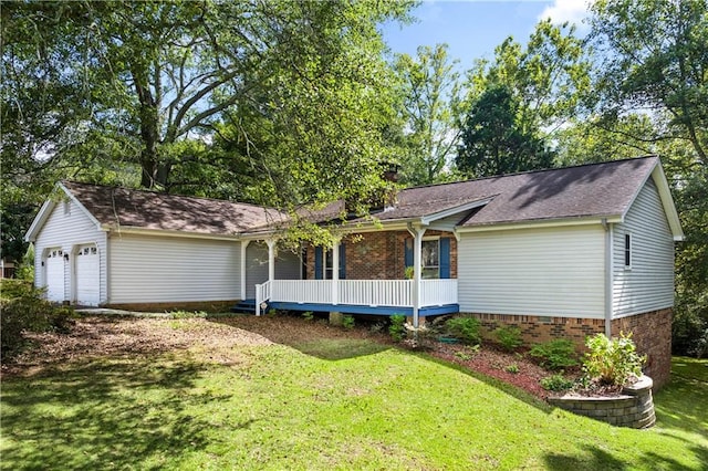 ranch-style house with a deck and a front lawn