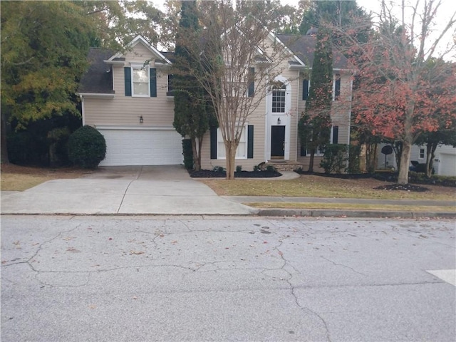 view of front of home with a garage