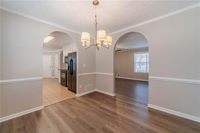 unfinished basement with visible vents and a ceiling fan