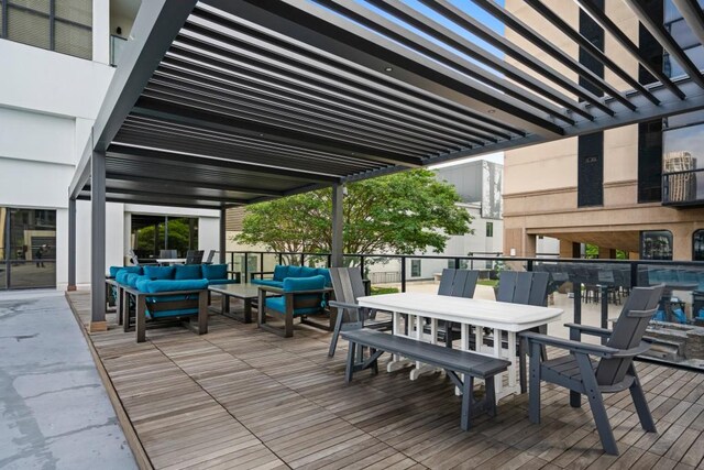 wooden terrace featuring an outdoor hangout area