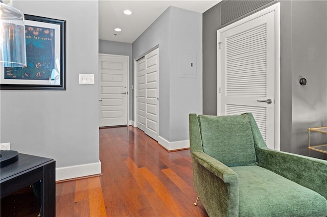 1080 Peachtree St NE Unit 2108, Atlanta, GA 30309 - hall featuring baseboards, wood finished floors, and recessed lighting