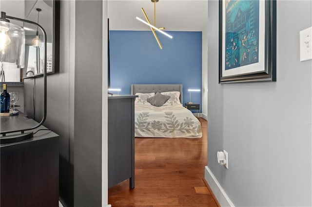 1080 Peachtree St NE Unit 2108, Atlanta, GA 30309 - bedroom featuring wood finished floors and baseboards