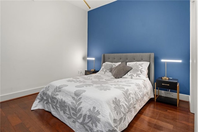 1080 Peachtree St NE Unit 2108, Atlanta, GA 30309 - bedroom featuring wood finished floors and baseboards