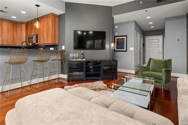 1080 Peachtree St NE Unit 2108, Atlanta, GA 30309 - living room featuring recessed lighting and wood finished floors
