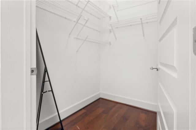 1080 Peachtree St NE Unit 2108, Atlanta, GA 30309 - walk in closet featuring dark wood-style flooring