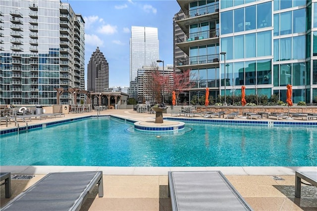1080 Peachtree St NE Unit 2108, Atlanta, GA 30309 - community pool with a view of city and a patio area