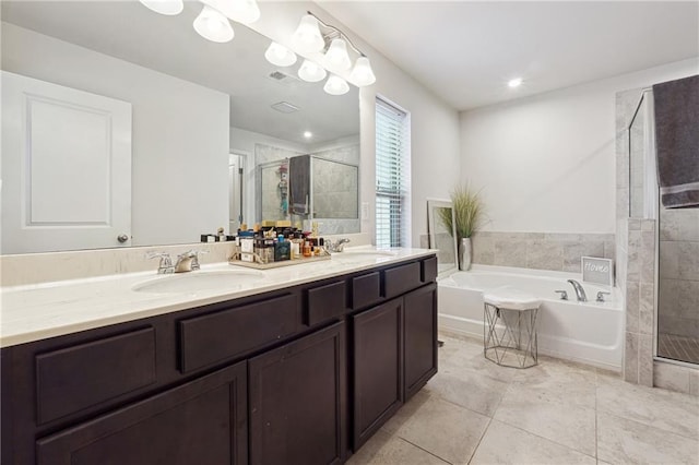 bathroom with vanity, separate shower and tub, and tile patterned flooring