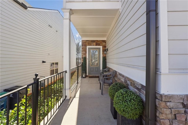 property entrance featuring covered porch