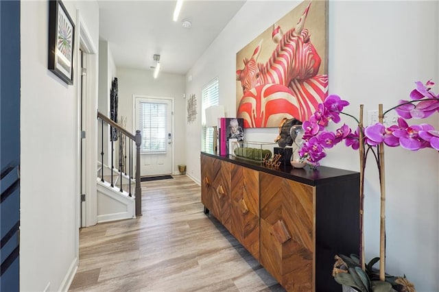 entryway with light hardwood / wood-style floors