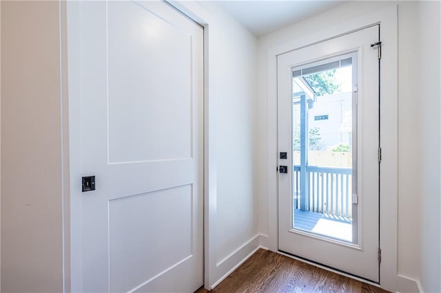 139 Sisson Ave NE, Atlanta, GA 30317 - doorway to outside featuring dark wood finished floors and baseboards