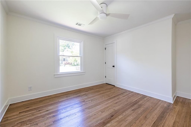 139 Sisson Ave NE, Atlanta, GA 30317 - unfurnished room with wood finished floors, crown molding, baseboards, and a ceiling fan