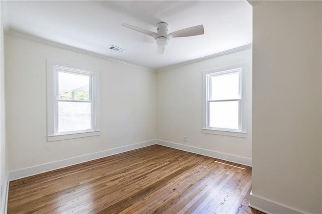 139 Sisson Ave NE, Atlanta, GA 30317 - empty room featuring wood-type flooring, ornamental molding, a ceiling fan, and baseboards
