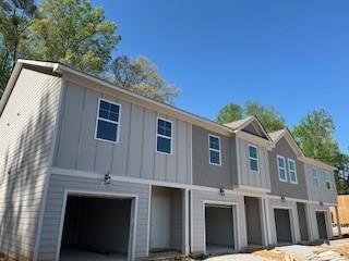 4258 SW Notting Hill Dr Unit 32, Atlanta, GA 30331 - view of front of property with a garage and driveway