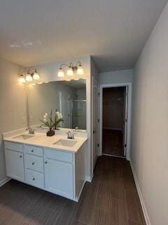 4258 SW Notting Hill Dr Unit 32, Atlanta, GA 30331 - full bathroom featuring a shower stall, double vanity, a sink, and baseboards
